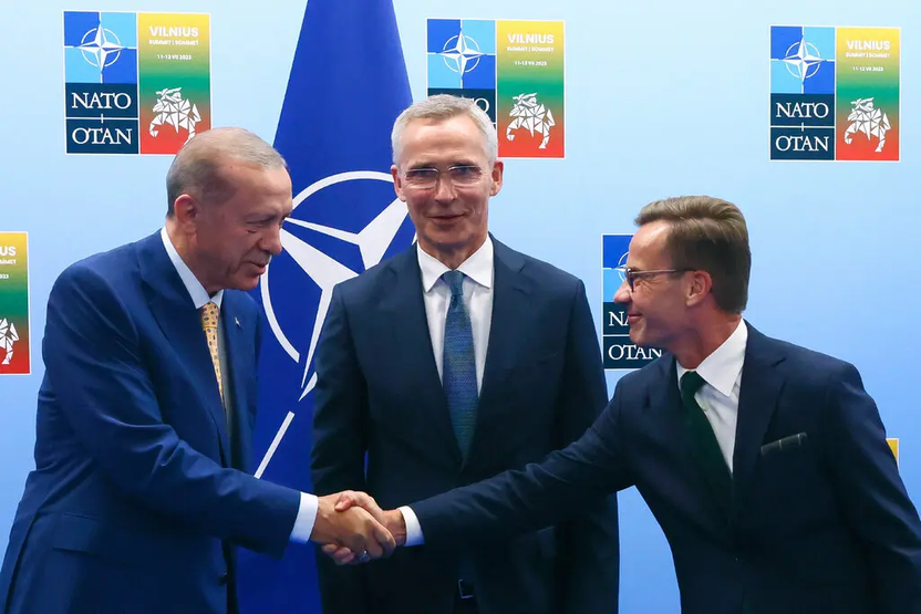 President Recep Tayyip Erdogan of Turkey, left, with Prime Minister Ulf Kristersson of Sweden, right, and Jens Stoltenberg, the NATO secretary general. (Credits: New York Times)