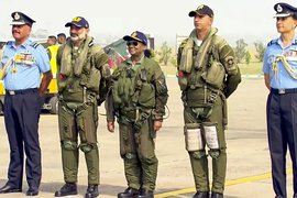 President Droupadi Murmu with Chief of the Air Staff Air Chief Marshal A.P. Singh, second from left, and others before she takes a sortie in Rafale fighter jet, at Air Force Station in Haryana's Ambala. | Photo Credit: PTI