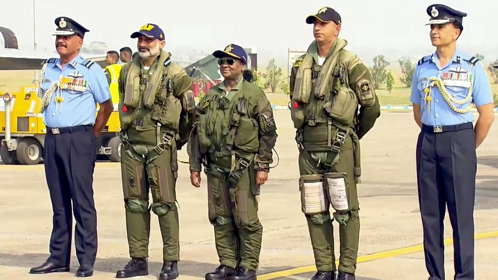 President Droupadi Murmu with Chief of the Air Staff Air Chief Marshal A.P. Singh, second from left, and others before she takes a sortie in Rafale fighter jet, at Air Force Station in Haryana's Ambala. | Photo Credit: PTI